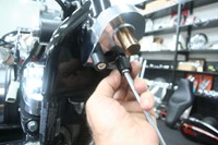 Install fork stops on bottom of offset adapter